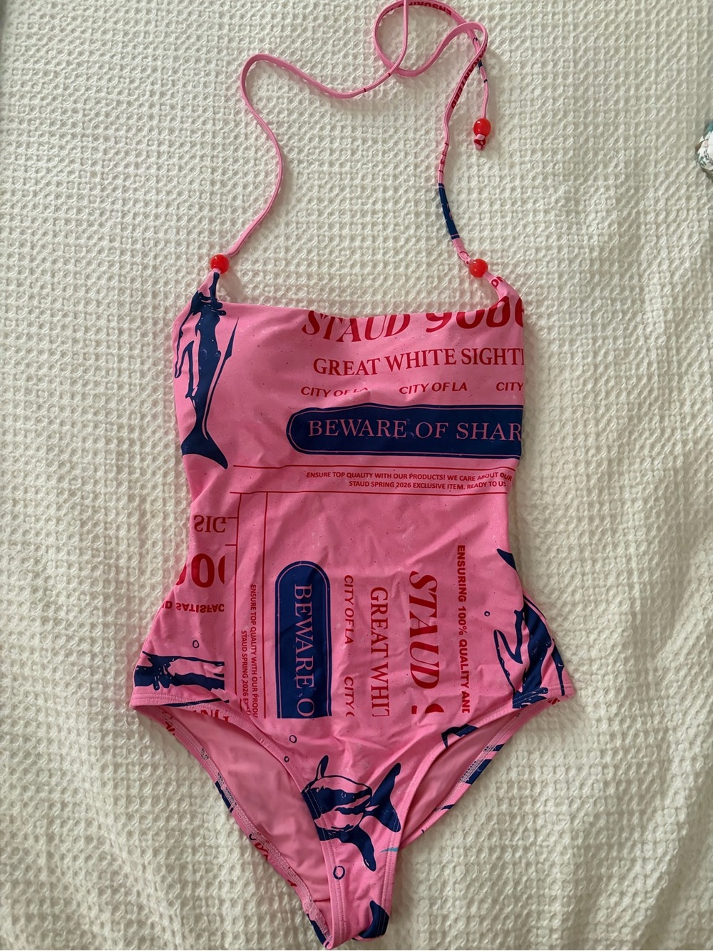 STAUD Nautical Pink One-Piece Swimsuit with Navy Shark Print